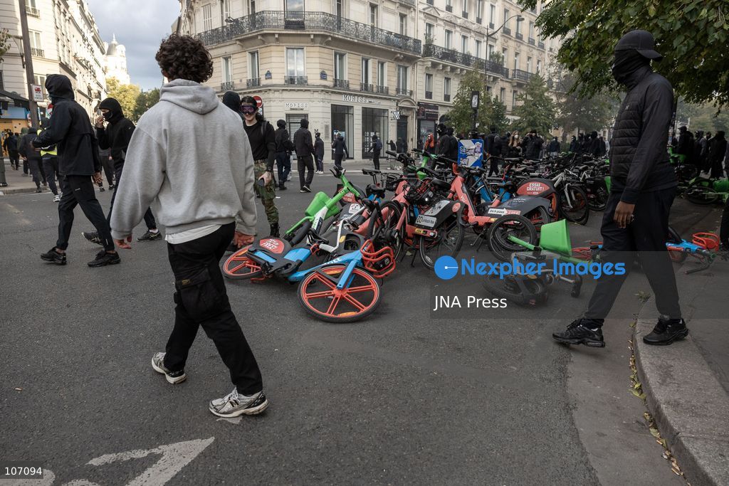 PARIS, FRANCE, OCTOBER 17, 2026: Demonstrators clash with riot police in and around Place de la République during protests against austerity and rising living costs, and in support of students demanding better school conditions. Makeshift barricades are erected and fires break out as police use tear gas and water cannons. Shops in surrounding streets are damaged and looted during the unrest. (Photo by Oualid Abdellaoui/JNA Press via Nexpher Images)