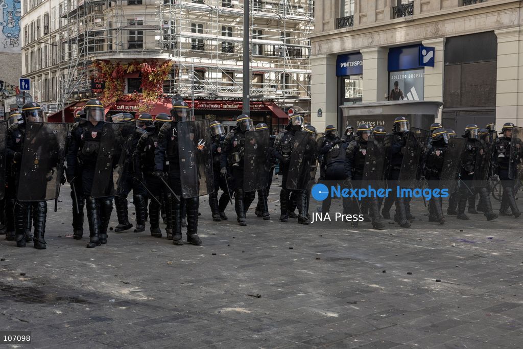 PARIS, FRANCE, OCTOBER 17, 2026: Demonstrators clash with riot police in and around Place de la République during protests against austerity and rising living costs, and in support of students demanding better school conditions. Makeshift barricades are erected and fires break out as police use tear gas and water cannons. Shops in surrounding streets are damaged and looted during the unrest. (Photo by Oualid Abdellaoui/JNA Press via Nexpher Images)