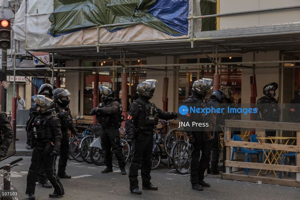 PARIS, FRANCE, OCTOBER 17, 2026: Demonstrators clash with riot police in and around Place de la République during protests against austerity and rising living costs, and in support of students demanding better school conditions. Makeshift barricades are erected and fires break out as police use tear gas and water cannons. Shops in surrounding streets are damaged and looted during the unrest. (Photo by Oualid Abdellaoui/JNA Press via Nexpher Images)