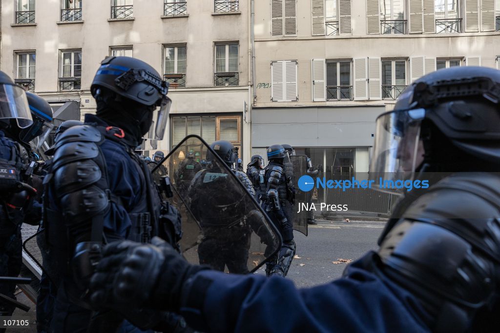 PARIS, FRANCE, OCTOBER 17, 2026: Demonstrators clash with riot police in and around Place de la République during protests against austerity and rising living costs, and in support of students demanding better school conditions. Makeshift barricades are erected and fires break out as police use tear gas and water cannons. Shops in surrounding streets are damaged and looted during the unrest. (Photo by Oualid Abdellaoui/JNA Press via Nexpher Images)