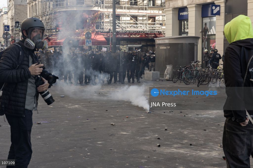 PARIS, FRANCE, OCTOBER 17, 2026: Demonstrators clash with riot police in and around Place de la République during protests against austerity and rising living costs, and in support of students demanding better school conditions. Makeshift barricades are erected and fires break out as police use tear gas and water cannons. Shops in surrounding streets are damaged and looted during the unrest. (Photo by Oualid Abdellaoui/JNA Press via Nexpher Images)