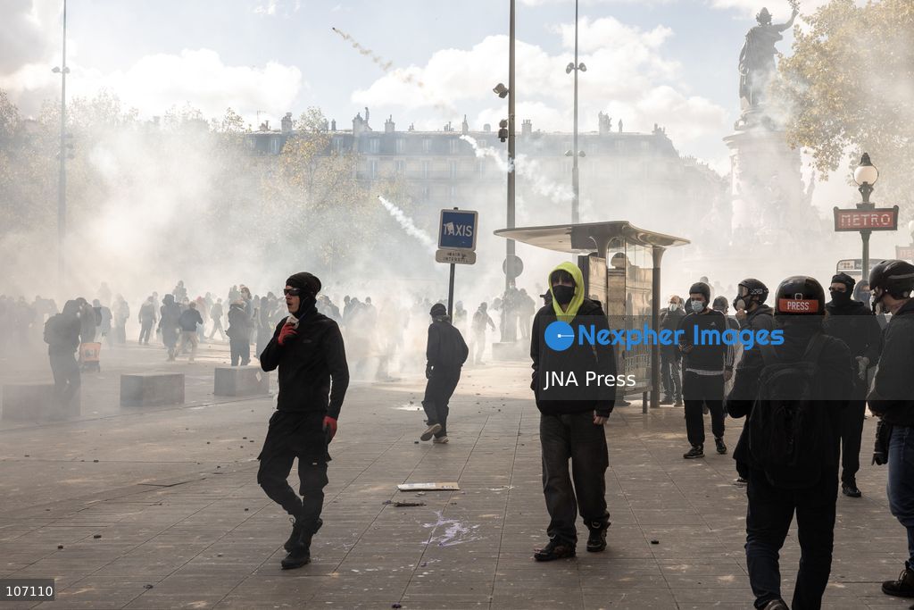 PARIS, FRANCE, OCTOBER 17, 2026: Demonstrators clash with riot police in and around Place de la République during protests against austerity and rising living costs, and in support of students demanding better school conditions. Makeshift barricades are erected and fires break out as police use tear gas and water cannons. Shops in surrounding streets are damaged and looted during the unrest. (Photo by Oualid Abdellaoui/JNA Press via Nexpher Images)