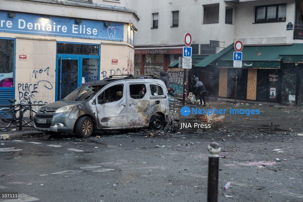 PARIS, FRANCE, OCTOBER 17, 2026: Demonstrators clash with riot police in and around Place de la République during protests against austerity and rising living costs, and in support of students demanding better school conditions. Makeshift barricades are erected and fires break out as police use tear gas and water cannons. Shops in surrounding streets are damaged and looted during the unrest. (Photo by Oualid Abdellaoui/JNA Press via Nexpher Images)