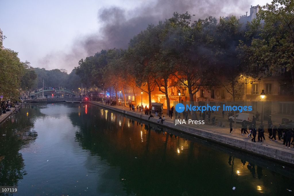 PARIS, FRANCE, OCTOBER 17, 2026: Demonstrators clash with riot police in and around Place de la République during protests against austerity and rising living costs, and in support of students demanding better school conditions. Makeshift barricades are erected and fires break out as police use tear gas and water cannons. Shops in surrounding streets are damaged and looted during the unrest. (Photo by Oualid Abdellaoui/JNA Press via Nexpher Images)