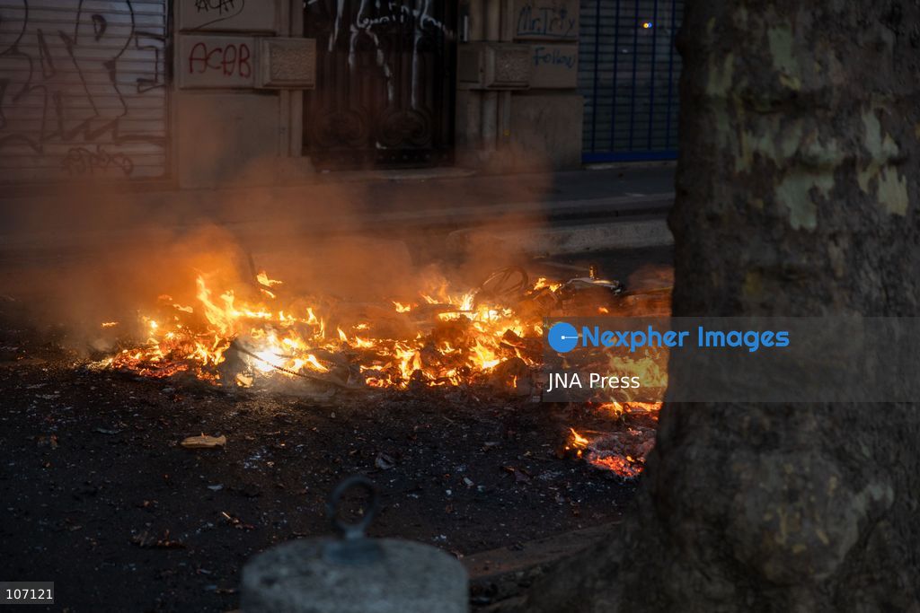 PARIS, FRANCE, OCTOBER 17, 2026: Demonstrators clash with riot police in and around Place de la République during protests against austerity and rising living costs, and in support of students demanding better school conditions. Makeshift barricades are erected and fires break out as police use tear gas and water cannons. Shops in surrounding streets are damaged and looted during the unrest. (Photo by Oualid Abdellaoui/JNA Press via Nexpher Images)