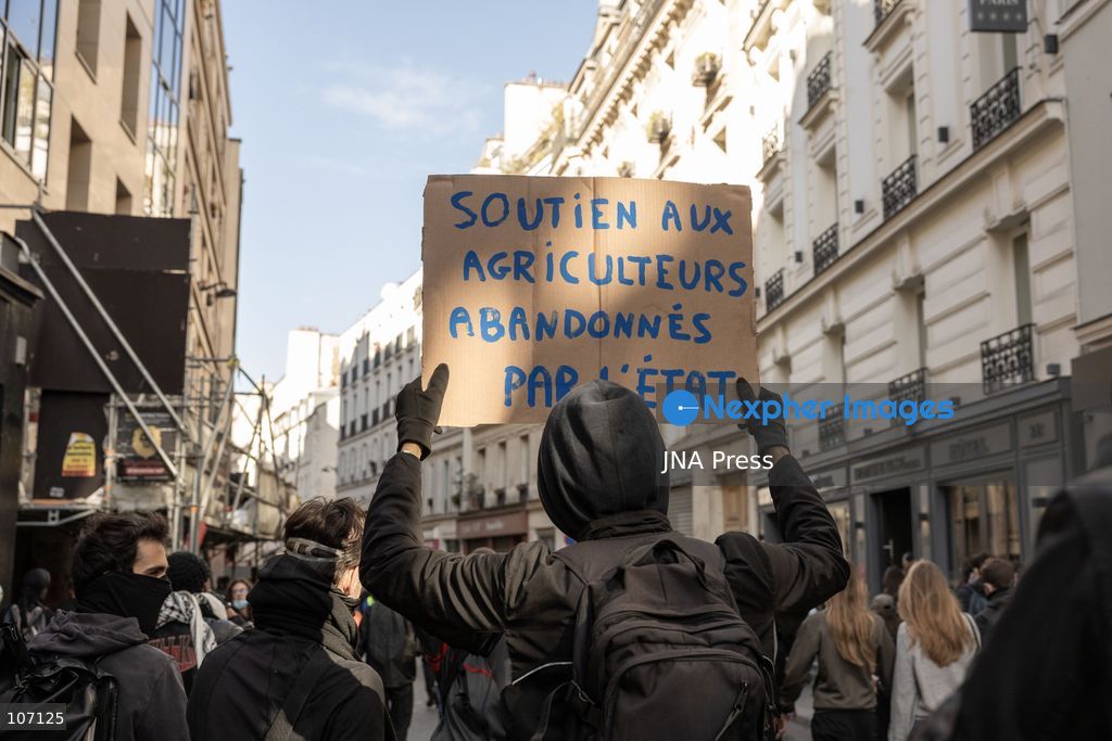 PARIS, FRANCE, OCTOBER 17, 2026: Demonstrators clash with riot police in and around Place de la République during protests against austerity and rising living costs, and in support of students demanding better school conditions. Makeshift barricades are erected and fires break out as police use tear gas and water cannons. Shops in surrounding streets are damaged and looted during the unrest. (Photo by Oualid Abdellaoui/JNA Press via Nexpher Images)