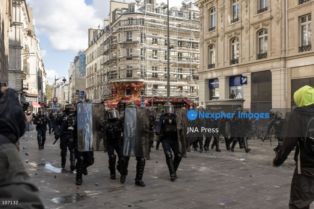 PARIS, FRANCE, OCTOBER 17, 2026: Demonstrators clash with riot police in and around Place de la République during protests against austerity and rising living costs, and in support of students demanding better school conditions. Makeshift barricades are erected and fires break out as police use tear gas and water cannons. Shops in surrounding streets are damaged and looted during the unrest. (Photo by Oualid Abdellaoui/JNA Press via Nexpher Images)