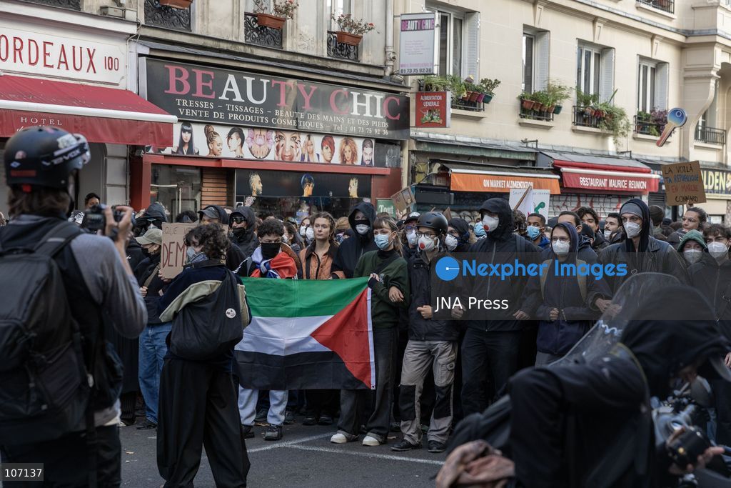 PARIS, FRANCE, OCTOBER 17, 2026: Demonstrators clash with riot police in and around Place de la République during protests against austerity and rising living costs, and in support of students demanding better school conditions. Makeshift barricades are erected and fires break out as police use tear gas and water cannons. Shops in surrounding streets are damaged and looted during the unrest. (Photo by Oualid Abdellaoui/JNA Press via Nexpher Images)