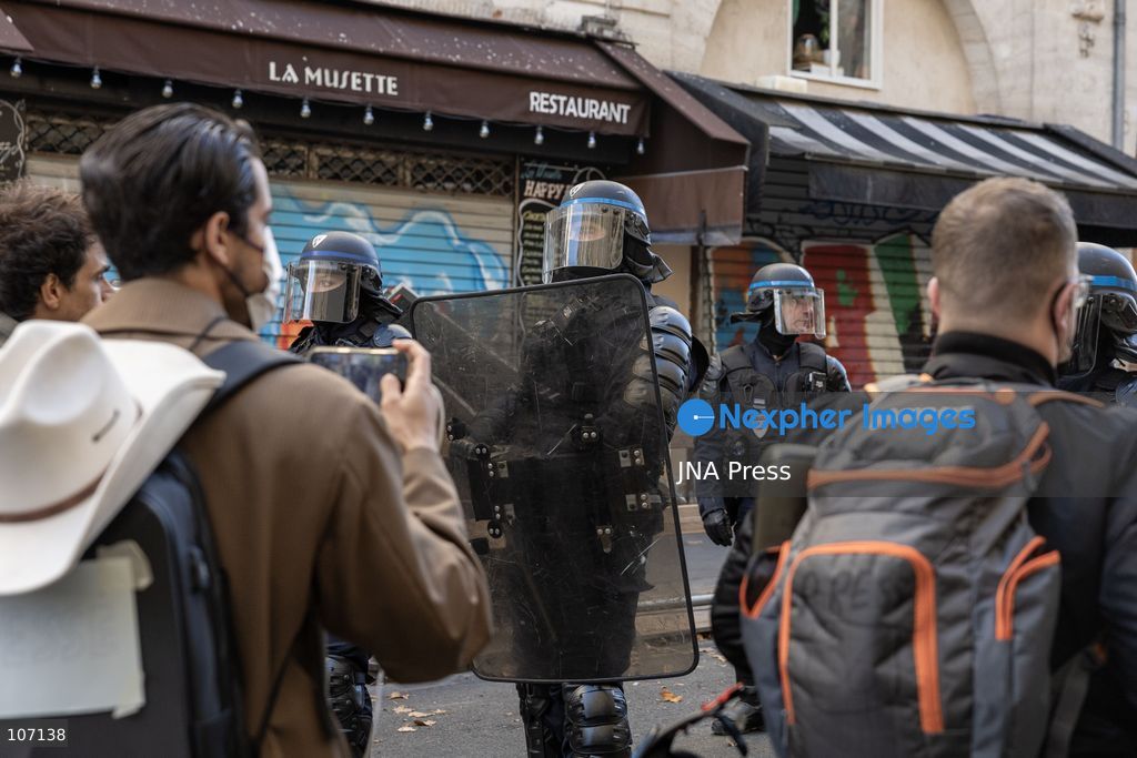 PARIS, FRANCE, OCTOBER 17, 2026: Demonstrators clash with riot police in and around Place de la République during protests against austerity and rising living costs, and in support of students demanding better school conditions. Makeshift barricades are erected and fires break out as police use tear gas and water cannons. Shops in surrounding streets are damaged and looted during the unrest. (Photo by Oualid Abdellaoui/JNA Press via Nexpher Images)