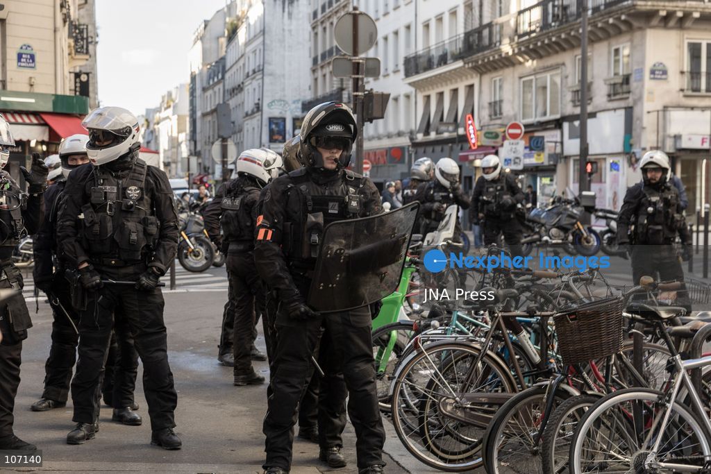 PARIS, FRANCE, OCTOBER 17, 2026: Demonstrators clash with riot police in and around Place de la République during protests against austerity and rising living costs, and in support of students demanding better school conditions. Makeshift barricades are erected and fires break out as police use tear gas and water cannons. Shops in surrounding streets are damaged and looted during the unrest. (Photo by Oualid Abdellaoui/JNA Press via Nexpher Images)