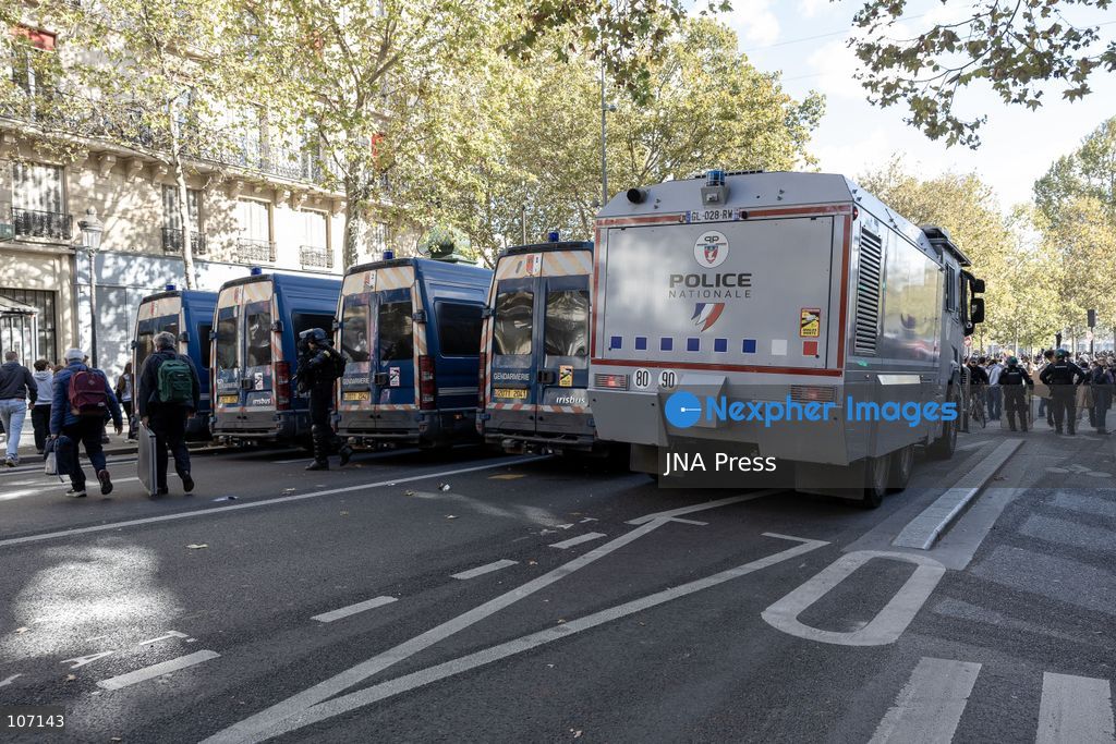 PARIS, FRANCE, OCTOBER 17, 2026: Demonstrators clash with riot police in and around Place de la République during protests against austerity and rising living costs, and in support of students demanding better school conditions. Makeshift barricades are erected and fires break out as police use tear gas and water cannons. Shops in surrounding streets are damaged and looted during the unrest. (Photo by Oualid Abdellaoui/JNA Press via Nexpher Images)