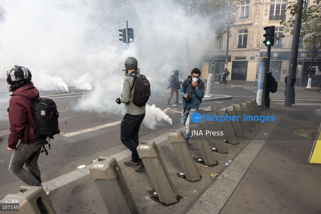 PARIS, FRANCE, OCTOBER 17, 2026: Demonstrators clash with riot police in and around Place de la République during protests against austerity and rising living costs, and in support of students demanding better school conditions. Makeshift barricades are erected and fires break out as police use tear gas and water cannons. Shops in surrounding streets are damaged and looted during the unrest. (Photo by Oualid Abdellaoui/JNA Press via Nexpher Images)