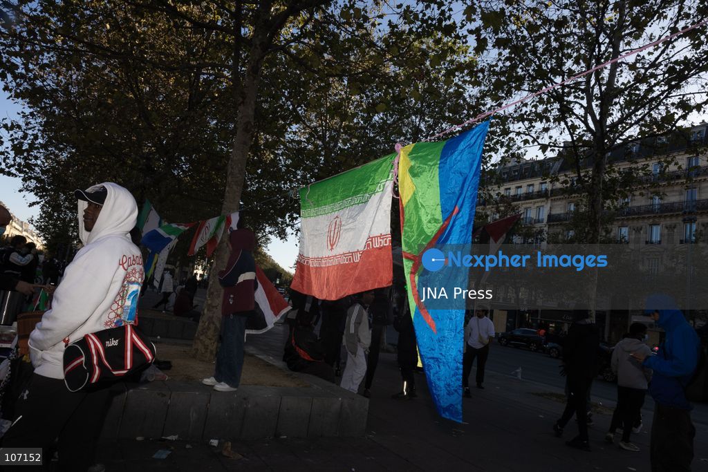 PARIS, FRANCE - OCTOBER 18, 2026: Protesters clash with police near Place de la République in Paris during a protest against austerity. Protesters set up makeshift barricades and start fires in the square and surrounding streets. After police clear the square, protesters attack nearby shops. (Photo by Oualid Abdellaoui/JNA Press via Nexpher Images)