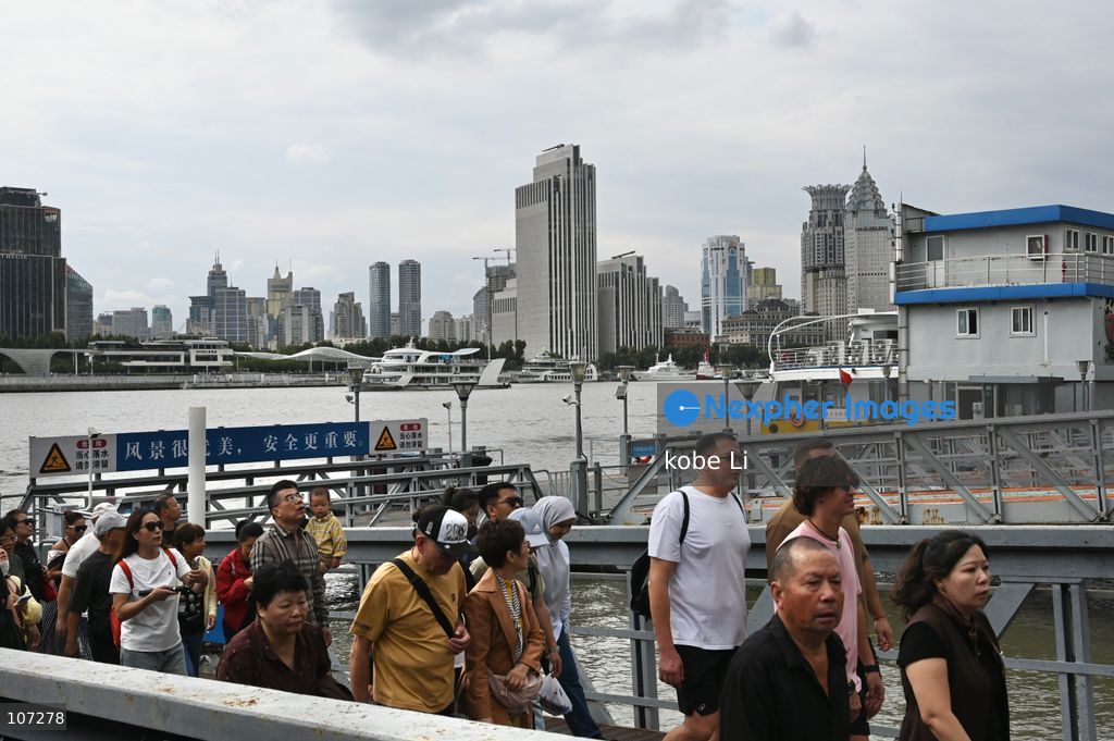 A general view showing passengers taking a ferry to Lujiazui on October 16, 2026 in Shanghai, China. (Photo by kobe Li/Nexpher Images)