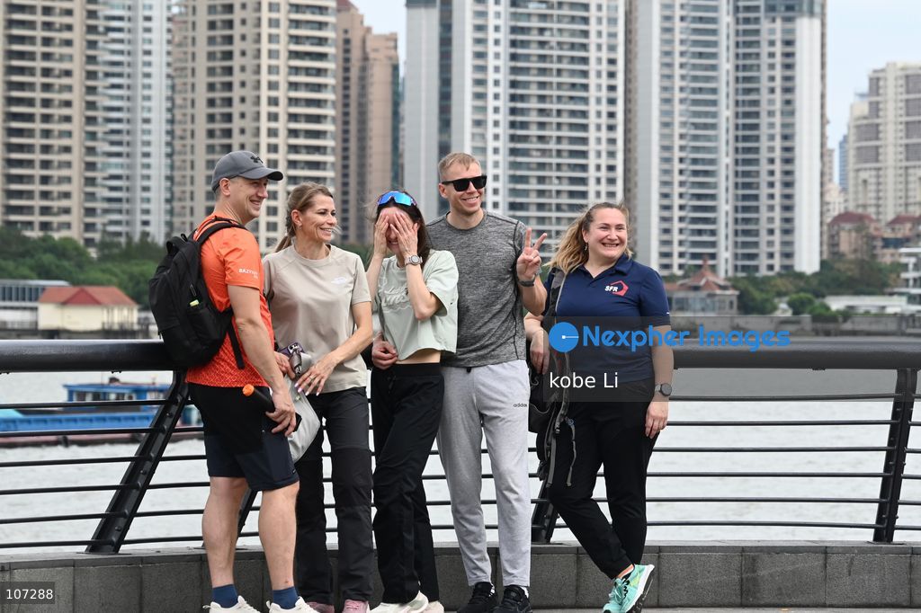 Tourists traveling at the Bund and posing photo on October 16, 2026 in Shanghai, China. (Photo by kobe Li/Nexpher Images)