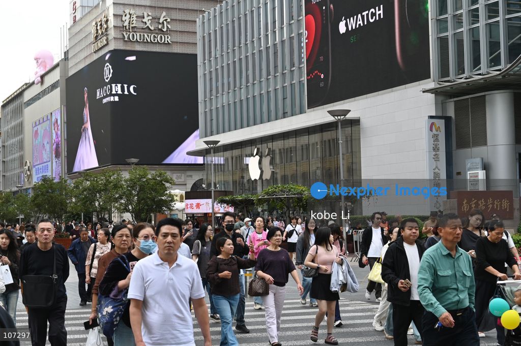 A general view showing people walking on the road on October 16, 2026 in Shanghai, China. (Photo by kobe Li/Nexpher Images)