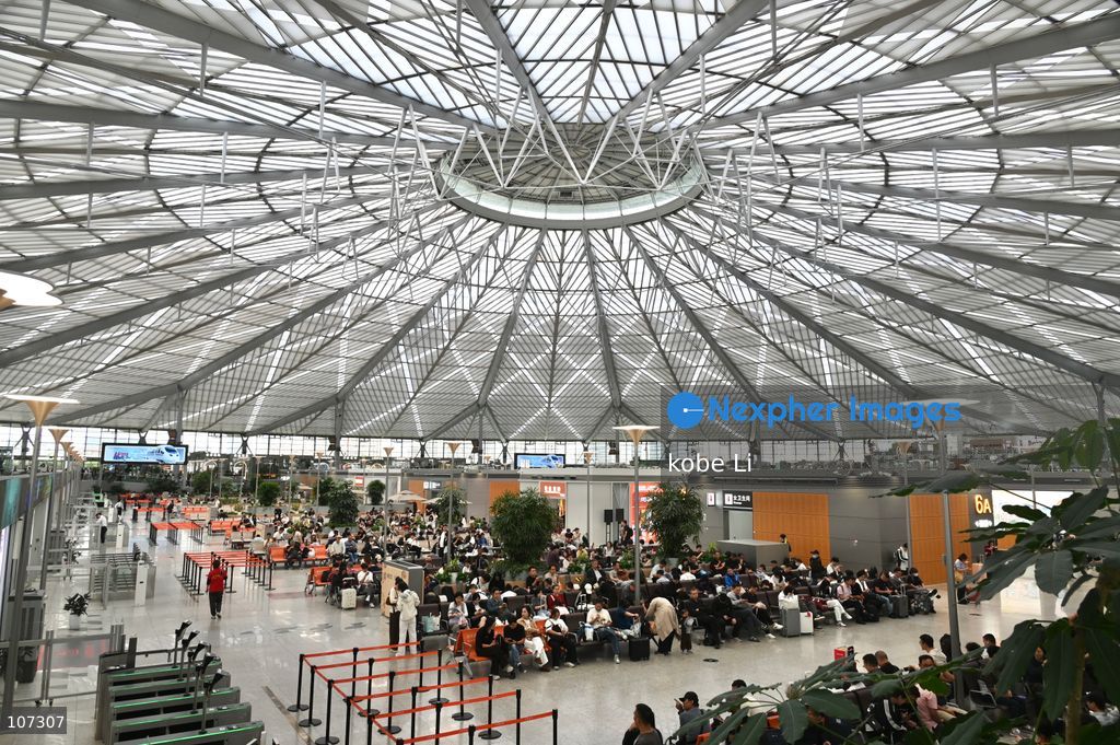 A general view showing passengers waiting at the Shanghainan Railway Station on October 16, 2026 in Shanghai, China. (Photo by kobe Li/Nexpher Images)