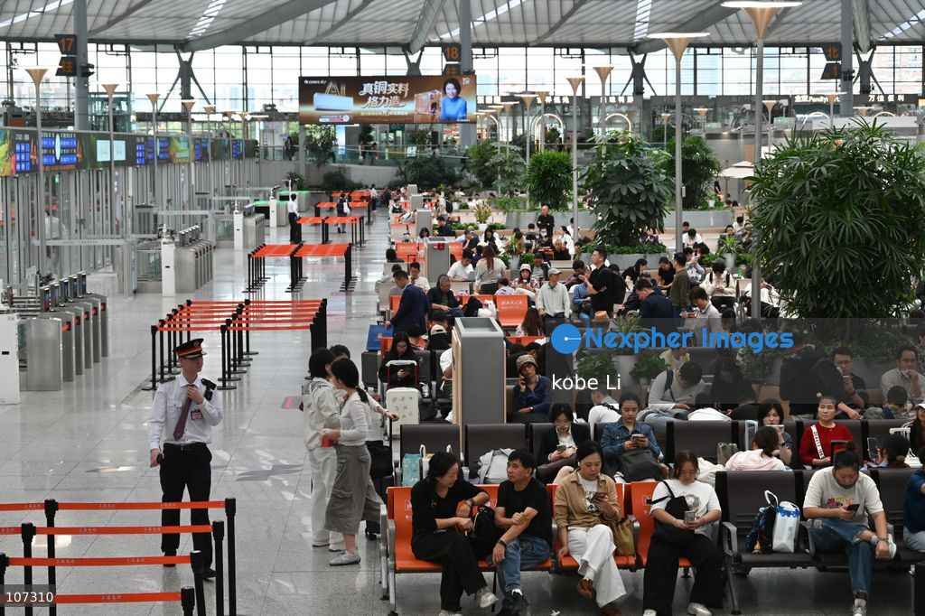 A general view showing passengers waiting at the Shanghainan Railway Station on October 16, 2026 in Shanghai, China. (Photo by kobe Li/Nexpher Images)
