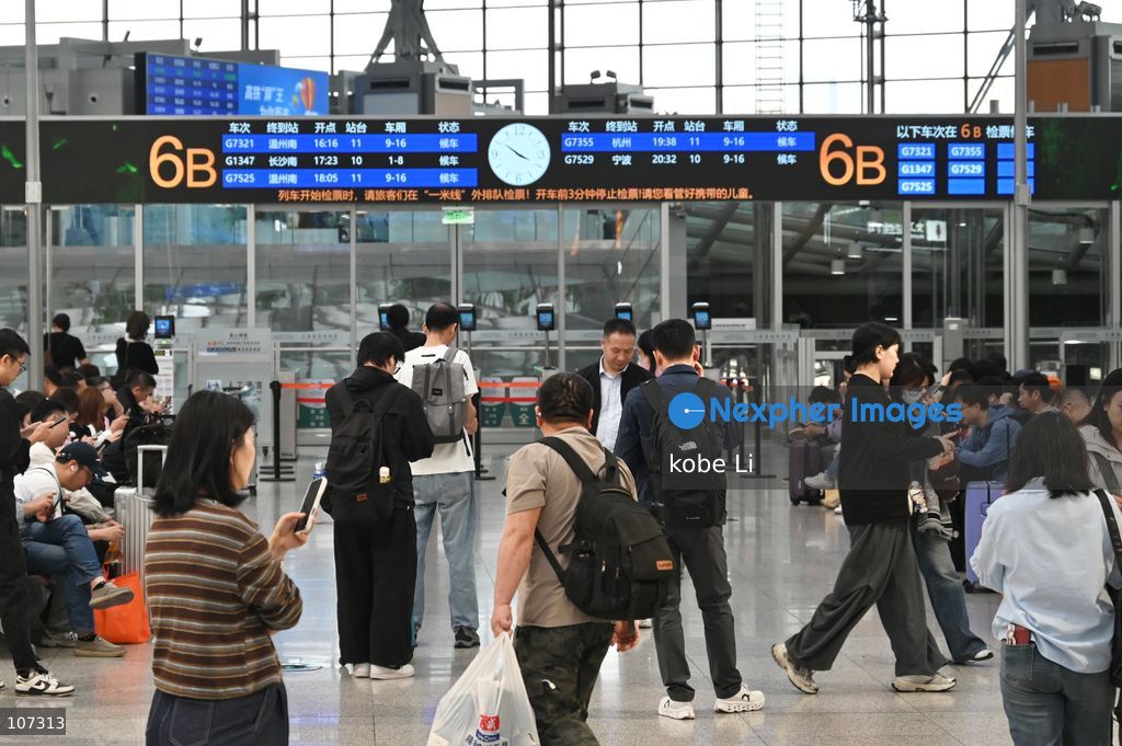 A general view showing passengers walking at the Shanghainan Railway Station on October 16, 2026 in Shanghai, China. (Photo by kobe Li/Nexpher Images)