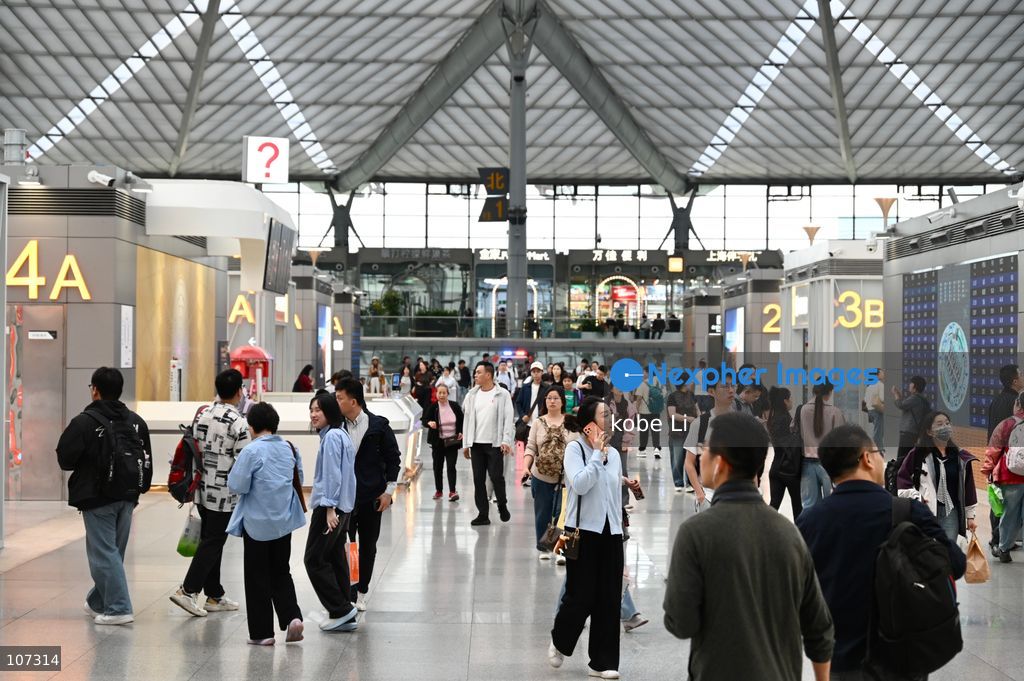 A general view showing passengers walking at the Shanghainan Railway Station on October 16, 2026 in Shanghai, China. (Photo by kobe Li/Nexpher Images)