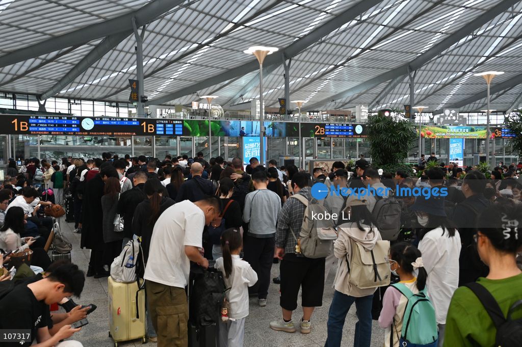 A general view showing passengers waiting at the Shanghainan Railway Station on October 16, 2026 in Shanghai, China. (Photo by kobe Li/Nexpher Images)