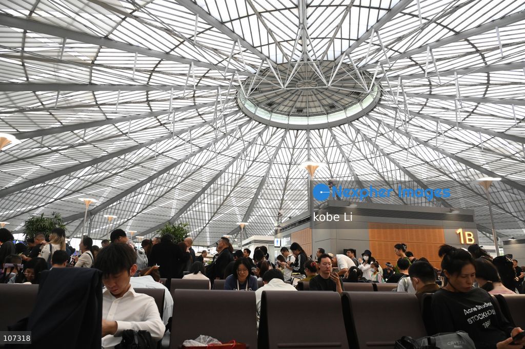 A general view showing passengers waiting at the Shanghainan Railway Station on October 16, 2026 in Shanghai, China. (Photo by kobe Li/Nexpher Images)