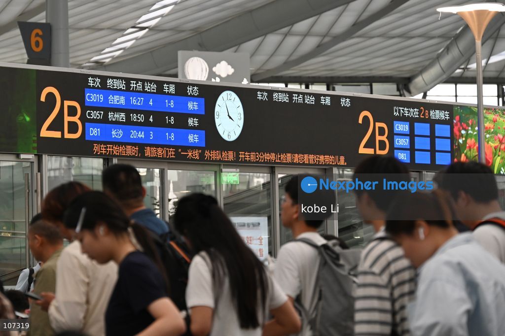 A general view showing passengers waiting at the Shanghainan Railway Station on October 16, 2026 in Shanghai, China. (Photo by kobe Li/Nexpher Images)