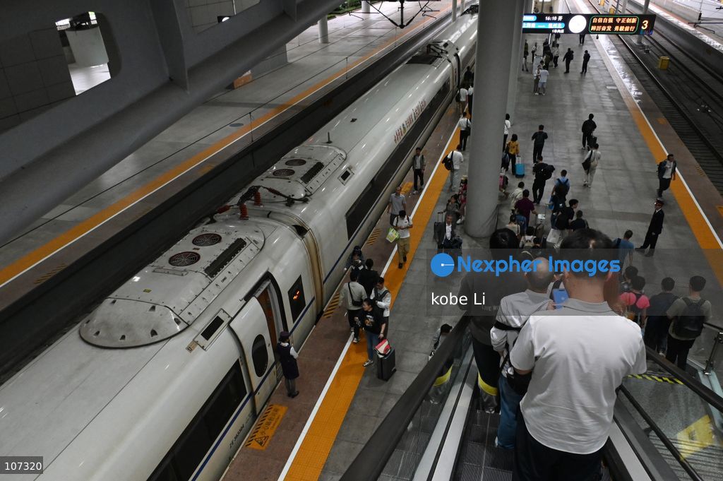 A general view showing passengers getting to the train at the Shanghainan Railway Station on October 16, 2026 in Shanghai, China. (Photo by kobe Li/Nexpher Images)