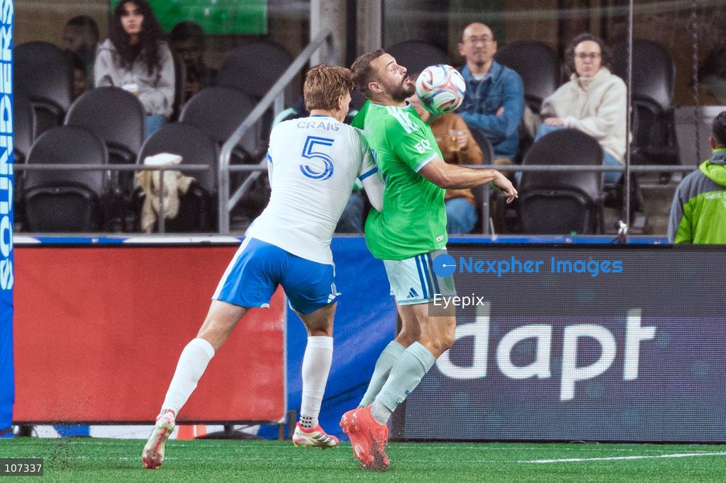 Jordan Morris #13 of Seattle Sounders FC and Brandan Craig #5 of CF Montréal battle for the ball during the MLS match between Sounders FC and CF Montréal at Lumen Field. on October 17, 2026 in Seattle, Washington. (Photo by Jules Doyle / Eyepix Group/Eyepix via Nexpher Images)