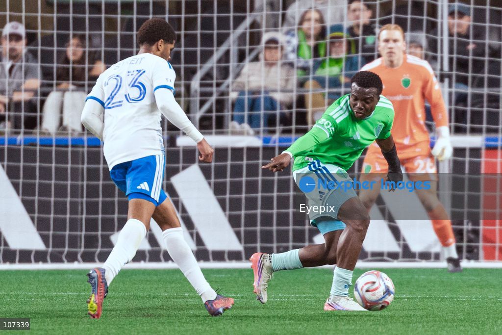 Nouhou Tolo #5 of Seattle Sounders is pressured by Noah Streit #23 of CF Montréal during the MLS match between Sounders FC and CF Montréal at Lumen Field. on October 17, 2026 in Seattle, Washington. (Photo by Jules Doyle / Eyepix Group/Eyepix via Nexpher Images)