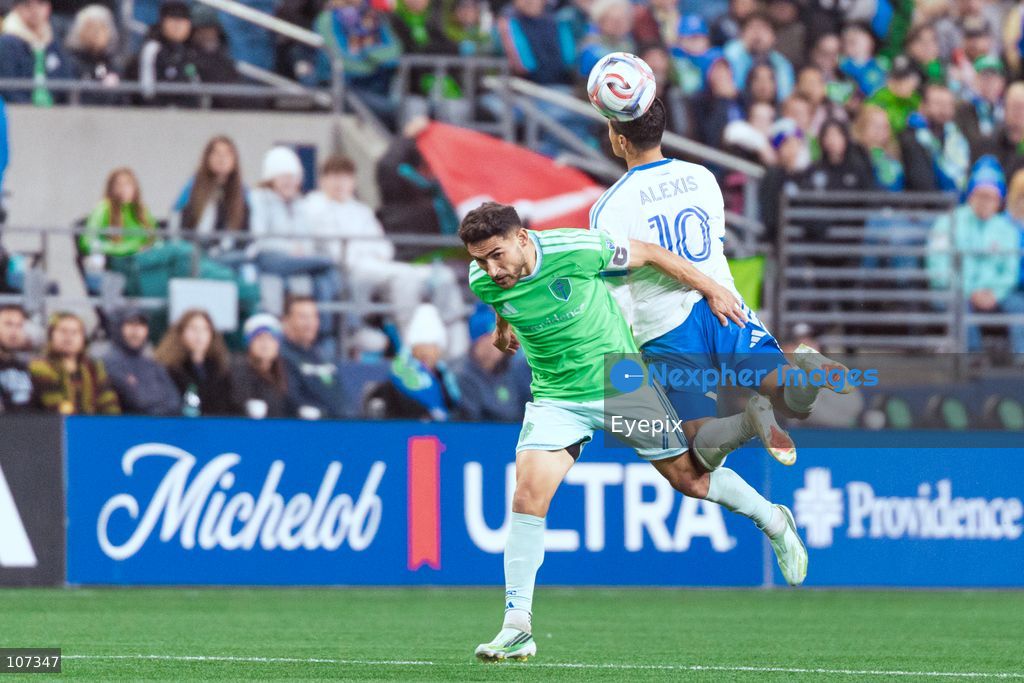 Cristian Roldan #7 of Seattle Sounders FC and Alexis Sánchez #10 of CF Montréal battle for the header during the MLS match between Sounders FC and CF Montréal at Lumen Field. on October 17, 2026 in Seattle, Washington. (Photo by Jules Doyle / Eyepix Group/Eyepix via Nexpher Images)