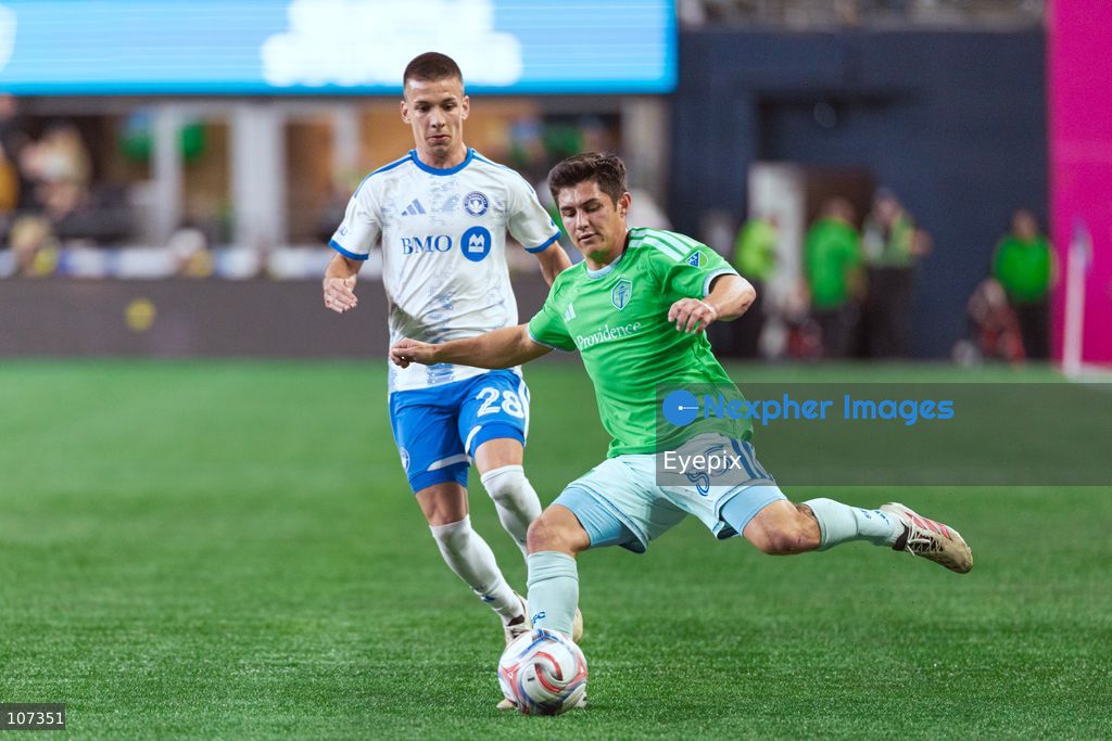 Kalani Kossa-Rienzi #85 of Seattle Sounders FC is pressured by Viktor Radojević #28 of CF Montréal during the MLS match between Sounders FC and CF Montréal at Lumen Field. on October 17, 2026 in Seattle, Washington. (Photo by Jules Doyle / Eyepix Group/Eyepix via Nexpher Images)
