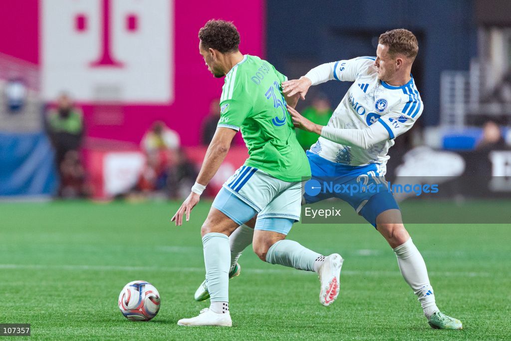 Hassani Dotson #31 of Seattle Sounders FC and Fabian Herbers #21 of CF Montréal battle for the ball during the MLS match between Sounders FC and CF Montréal at Lumen Field. on October 17, 2026 in Seattle, Washington. (Photo by Jules Doyle / Eyepix Group/Eyepix via Nexpher Images)