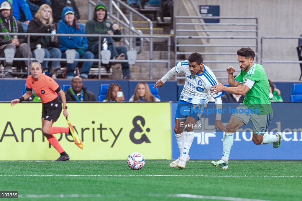 Alexis Sánchez #10 of CF Montréal and Cristian Roldan #7 of Seattle Sounders FC battle for the ball during the MLS match between Sounders FC and CF Montréal at Lumen Field. on October 17, 2026 in Seattle, Washington. (Photo by Jules Doyle / Eyepix Group/Eyepix via Nexpher Images)