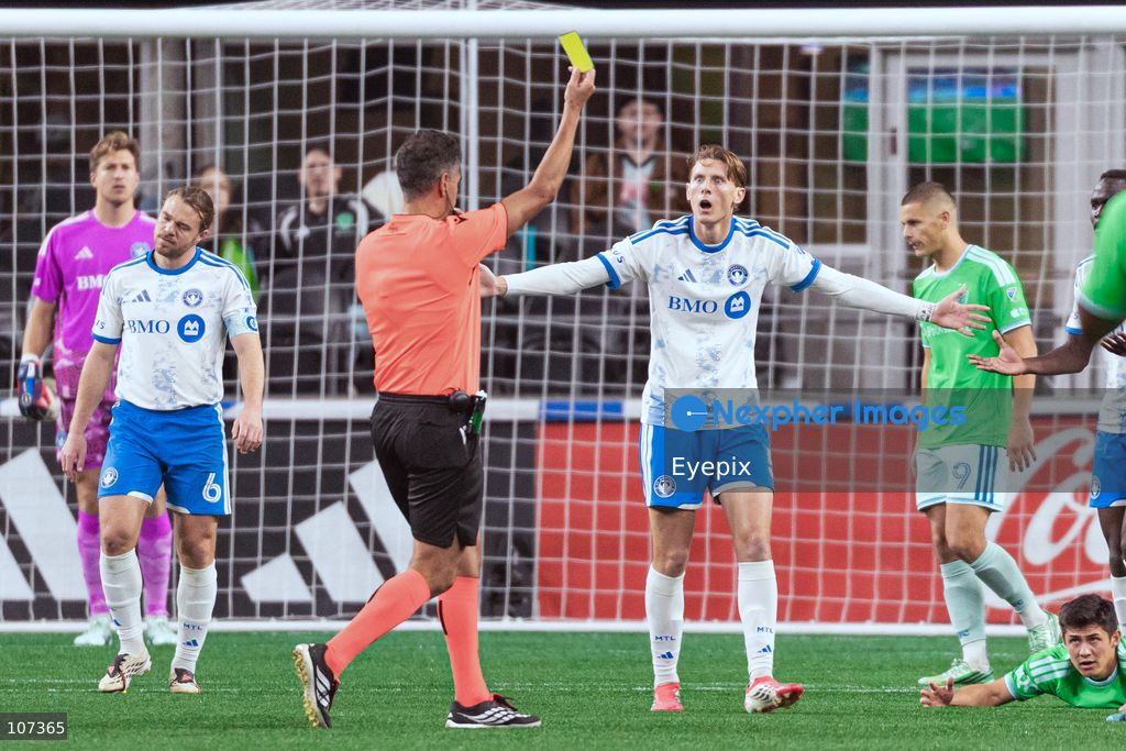Brandan Craig #5 of CF Montréal receives a yellow card by the referee during the MLS match between Sounders FC and CF Montréal at Lumen Field. on October 17, 2026 in Seattle, Washington. (Photo by Jules Doyle / Eyepix Group/Eyepix via Nexpher Images)