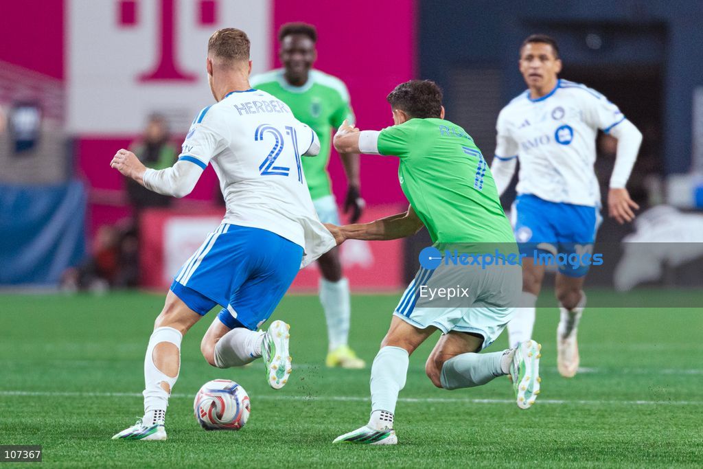 Fabian Herbers #21 of CF Montréal and Cristian Roldan #7 of Seattle Sounders FC battle for the ball during the MLS match between Sounders FC and CF Montréal at Lumen Field. on October 17, 2026 in Seattle, Washington. (Photo by Jules Doyle / Eyepix Group/Eyepix via Nexpher Images)