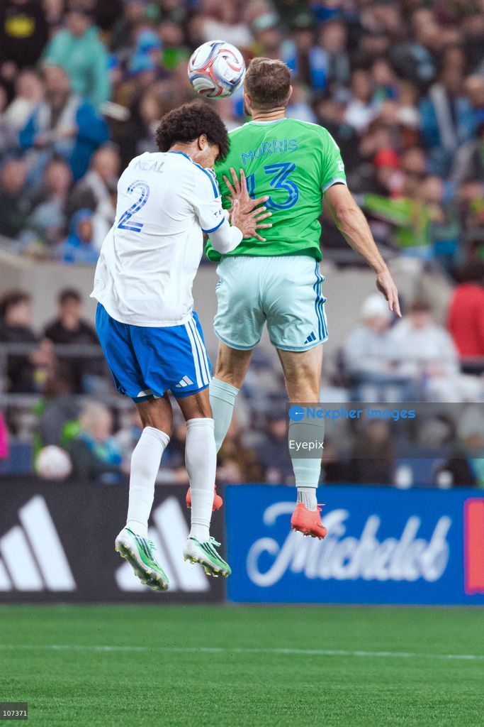 Jordan Morris #13 of Seattle Sounders FC and Jalen Neal #2 of CF Montréal battle for the header during the MLS match between Sounders FC and CF Montréal at Lumen Field. on October 17, 2026 in Seattle, Washington. (Photo by Jules Doyle / Eyepix Group/Eyepix via Nexpher Images)