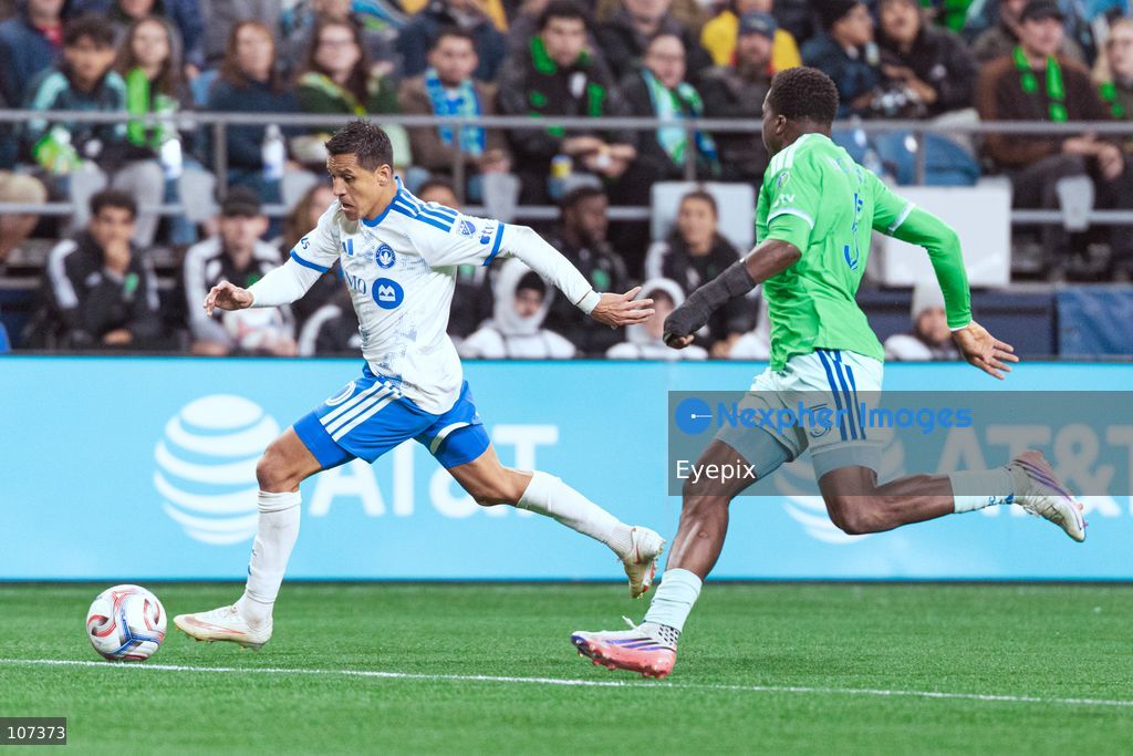 Alexis Sánchez #10 of CF Montréal is pressured by Nouhou Tolo #5 of Seattle Sounders during the MLS match between Sounders FC and CF Montréal at Lumen Field. on October 17, 2026 in Seattle, Washington. (Photo by Jules Doyle / Eyepix Group/Eyepix via Nexpher Images)