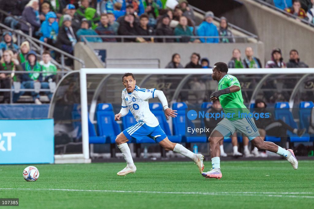 Alexis Sánchez #10 of CF Montréal is pressured by Nouhou Tolo #5 of Seattle Sounders during the MLS match between Sounders FC and CF Montréal at Lumen Field. on October 17, 2026 in Seattle, Washington. (Photo by Jules Doyle / Eyepix Group/Eyepix via Nexpher Images)