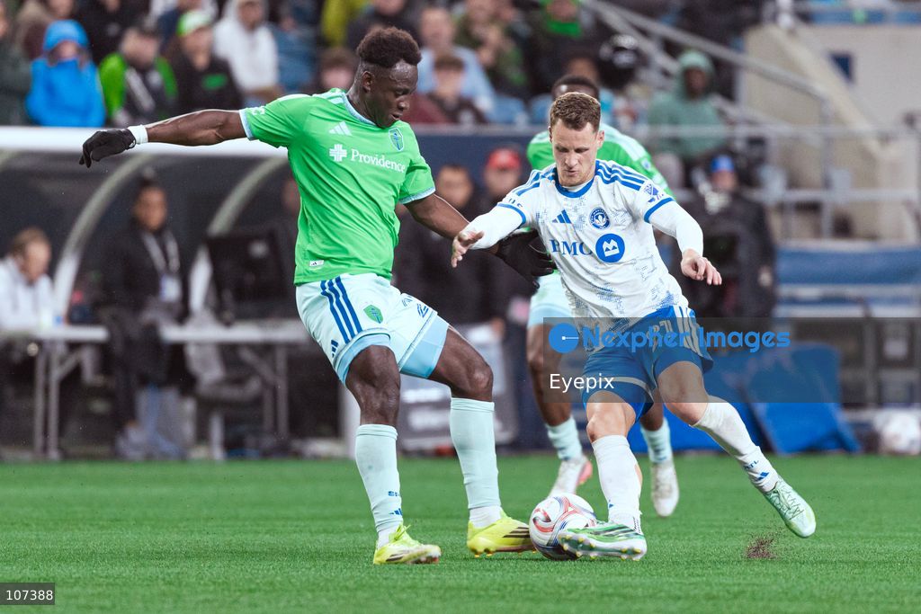 Fabian Herbers #21 of CF Montréal and Yeimar Gómez Andrade #28 of Seattle Sounders FC battle for the ball during the MLS match between Sounders FC and CF Montréal at Lumen Field. on October 17, 2026 in Seattle, Washington. (Photo by Jules Doyle / Eyepix Group/Eyepix via Nexpher Images)