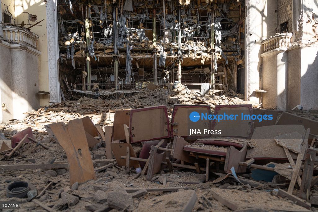 KRAMATORSK, UKRAINE, OCTOBER 19, 2026: People clear debris at the Good News church in Kramatorsk, Donetsk region, a day after the building was hit by a Russian airstrike. Debris removed from inside is burned during the cleanup, while a car parked outside has shattered windows and a damaged tyre. (Photo by Andrew Cling/JNA Press via Nexpher Images)