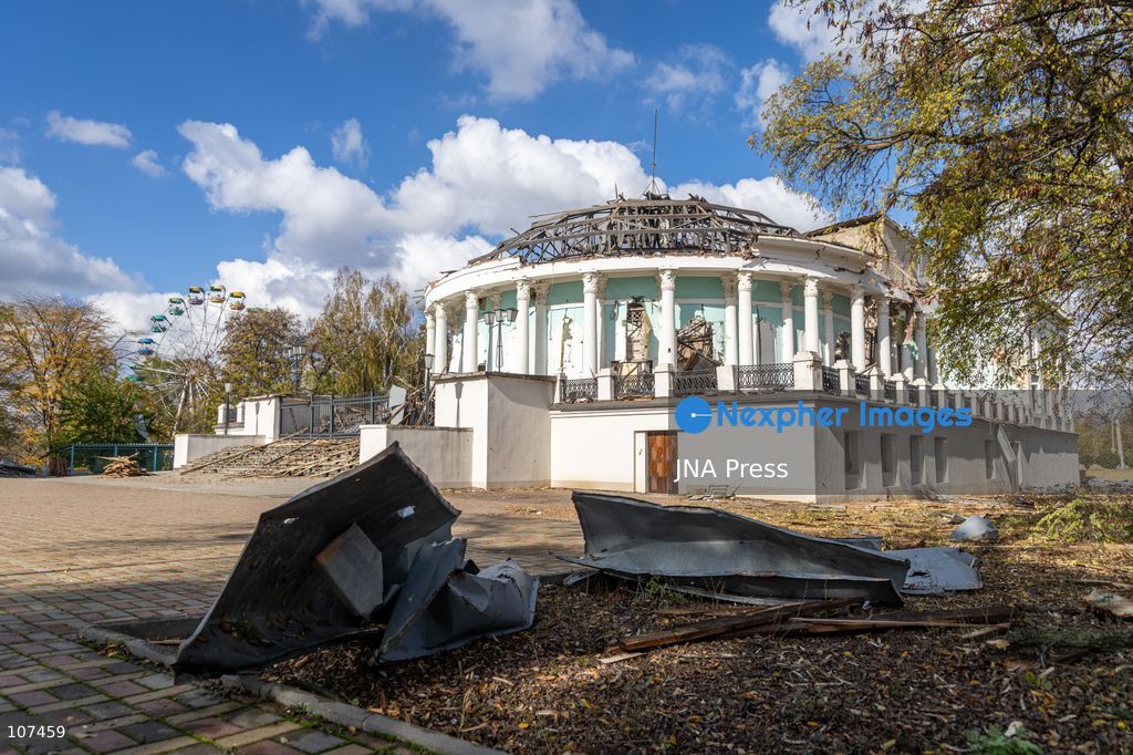 KRAMATORSK, UKRAINE, OCTOBER 19, 2026: People clear debris at the Good News church in Kramatorsk, Donetsk region, a day after the building was hit by a Russian airstrike. Debris removed from inside is burned during the cleanup, while a car parked outside has shattered windows and a damaged tyre. (Photo by Andrew Cling/JNA Press via Nexpher Images)
