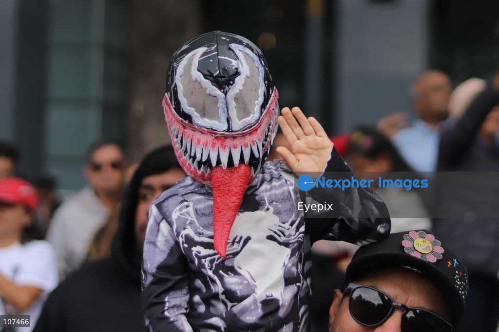 A participant disguised as Venom takes part in the 19th annual "Zombie Walk Mexico" (Marcha Zombie) along Reforma Avenue. Thousands of people dressed up as the undead gathered for the annual parade for Halloween celebrations on October 18, 2026 in Mexico City, Mexico. (Photo by Carlos Santiago/ Eyepix Group/Eyepix via Nexpher Images)