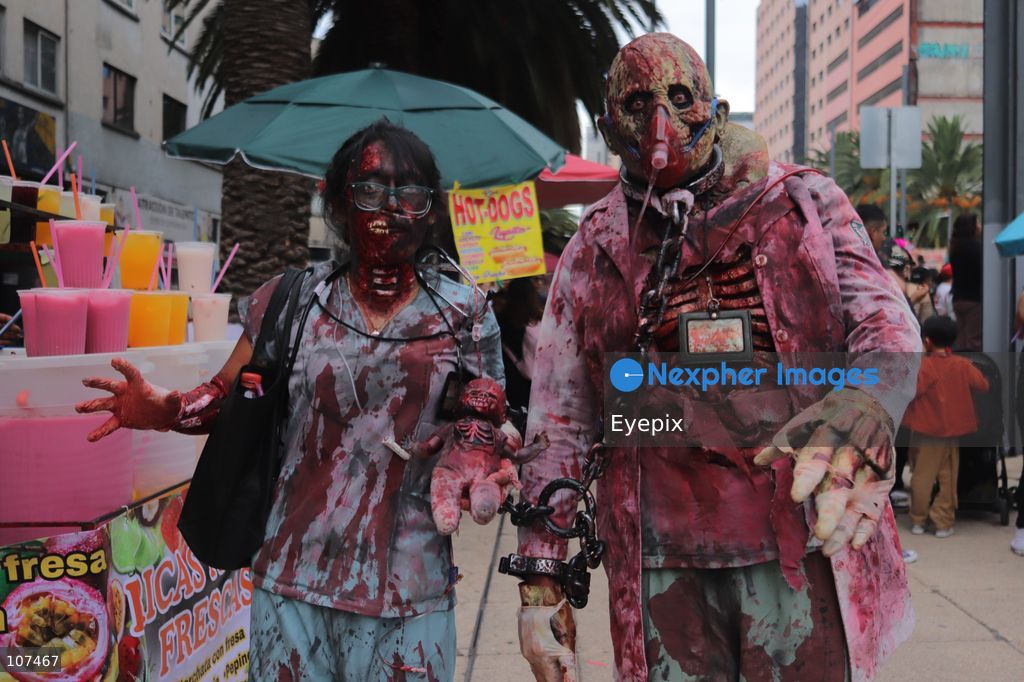 Participants disguised as zombies take part in the 19th annual "Zombie Walk Mexico" (Marcha Zombie) along Reforma Avenue. Thousands of people dressed up as the undead gathered for the annual parade for Halloween celebrations on October 18, 2026 in Mexico City, Mexico. (Photo by Carlos Santiago/ Eyepix Group/Eyepix via Nexpher Images)