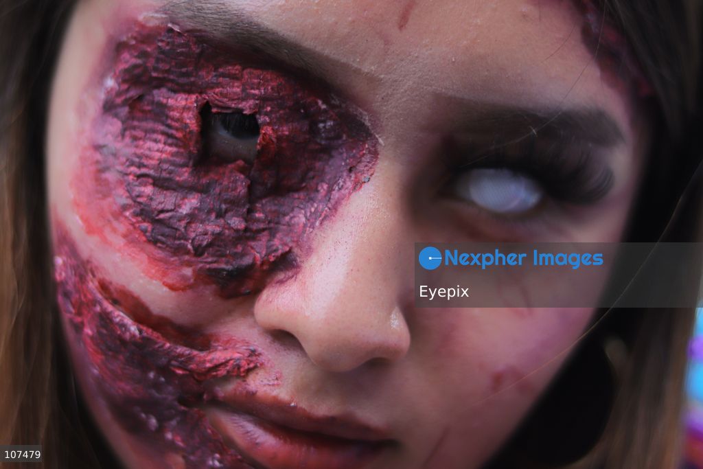 A participant wearing prosthetic makeup and horror contact lenses takes part in the 19th annual "Zombie Walk Mexico" (Marcha Zombie) along Reforma Avenue. Thousands of people dressed up as the undead gathered for the annual parade for Halloween celebrations on October 18, 2026 in Mexico City, Mexico. (Photo by Carlos Santiago/ Eyepix Group/Eyepix via Nexpher Images)