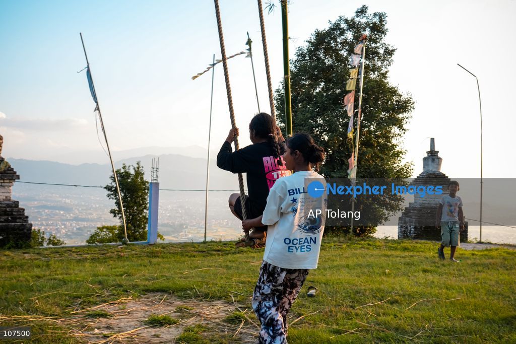 Bhaktapur, NEPAL, October 19, 2026: People enjoy playing on a traditional bamboo swing (Linge Ping) during the Dashain festival in Bhaktapur, Nepal (Photo by AP Tolang/Nexpher Images)