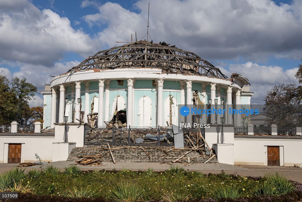 TOP PICS - KRAMATORSK, UKRAINE, OCTOBER 19, 2026: People clear debris at the Good News church in Kramatorsk, Donetsk region, a day after the building was hit by a Russian airstrike. Debris removed from inside is burned during the cleanup, while a car parked outside has shattered windows and a damaged tyre. (Photo by Andrew Cling/JNA Press via Nexpher Images)