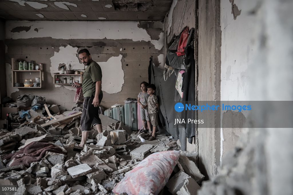 GAZA CITY, PALESTINE, OCTOBER 20, 2026: Palestinians inspect damage to a residential apartment following an Israeli airstrike in the Rimal neighbourhood of Gaza City. The early-morning strike killed Akram Yassin and his wife, according to medical sources. Skaik / JNA Press. (Photo by Mohammed M Skaik/JNA Press via Nexpher Images)