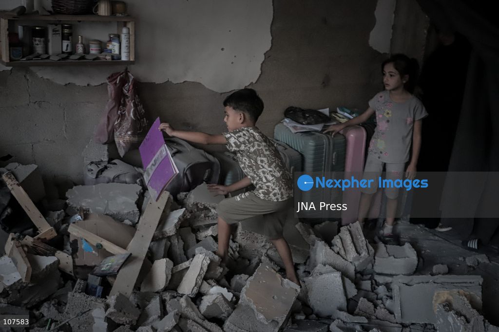 GAZA CITY, PALESTINE, OCTOBER 20, 2026: Palestinians inspect damage to a residential apartment following an Israeli airstrike in the Rimal neighbourhood of Gaza City. The early-morning strike killed Akram Yassin and his wife, according to medical sources. Skaik / JNA Press. (Photo by Mohammed M Skaik/JNA Press via Nexpher Images)
