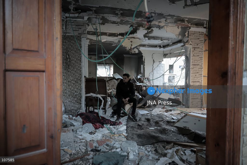 GAZA CITY, PALESTINE, OCTOBER 20, 2026: Palestinians inspect damage to a residential apartment following an Israeli airstrike in the Rimal neighbourhood of Gaza City. The early-morning strike killed Akram Yassin and his wife, according to medical sources. Skaik / JNA Press. (Photo by Mohammed M Skaik/JNA Press via Nexpher Images)